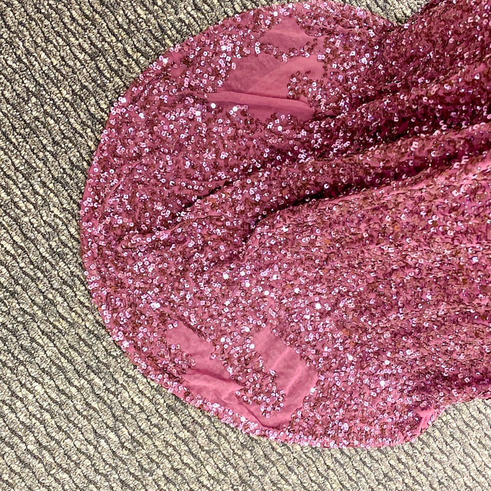 From Mia Bella. Worn once, slight damage to the train. Size US 2